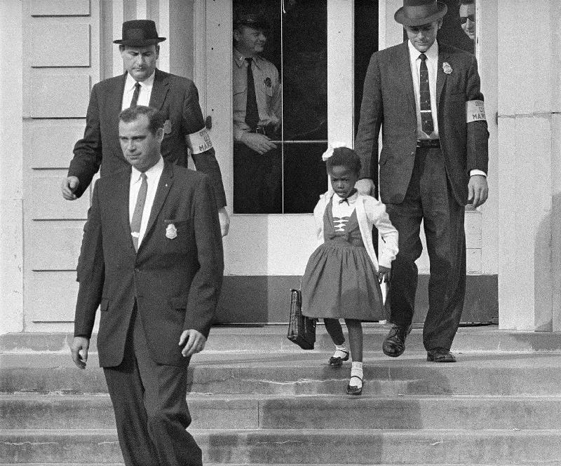 Deputy U.S. Marshals Escort Ruby Bridges to School in 1960.